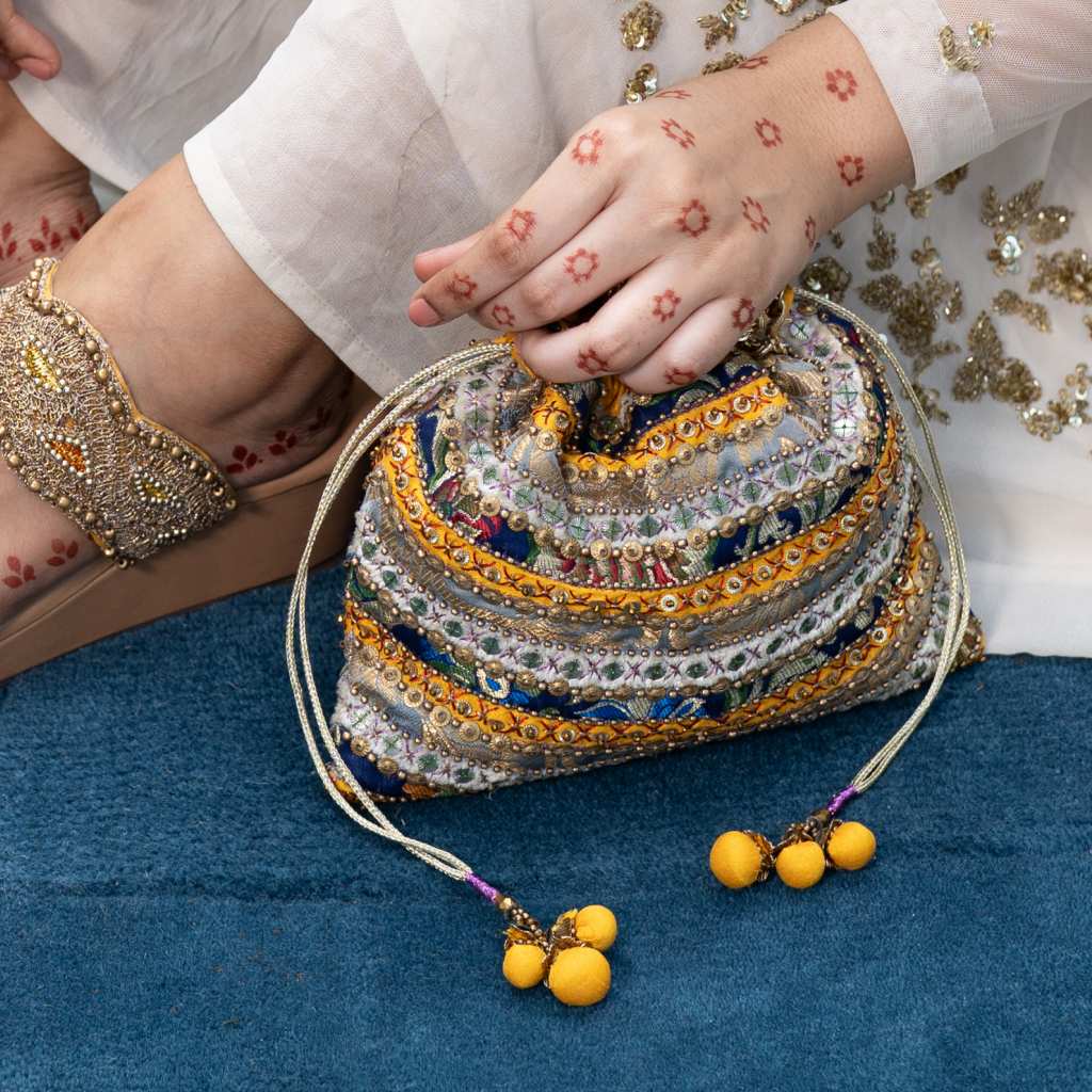 Golden Gossip : Potli